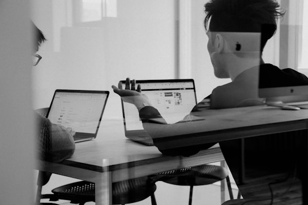 Startup marketing team reviewing email and SMS retention strategy